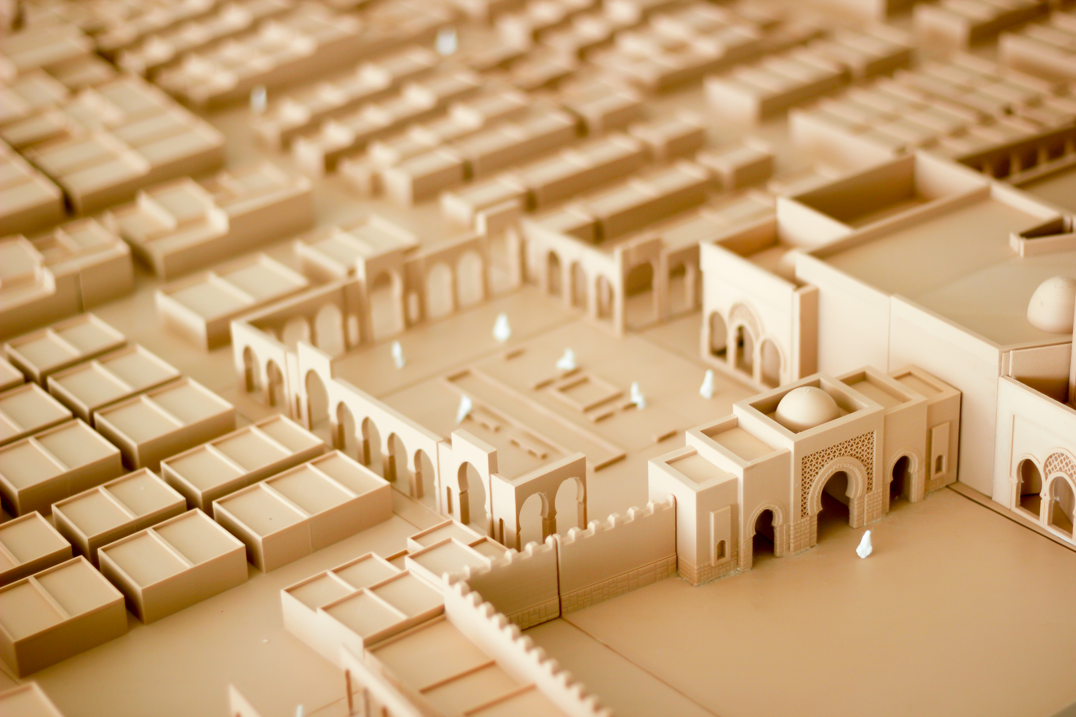 Market stalls, ramparts and a city gate