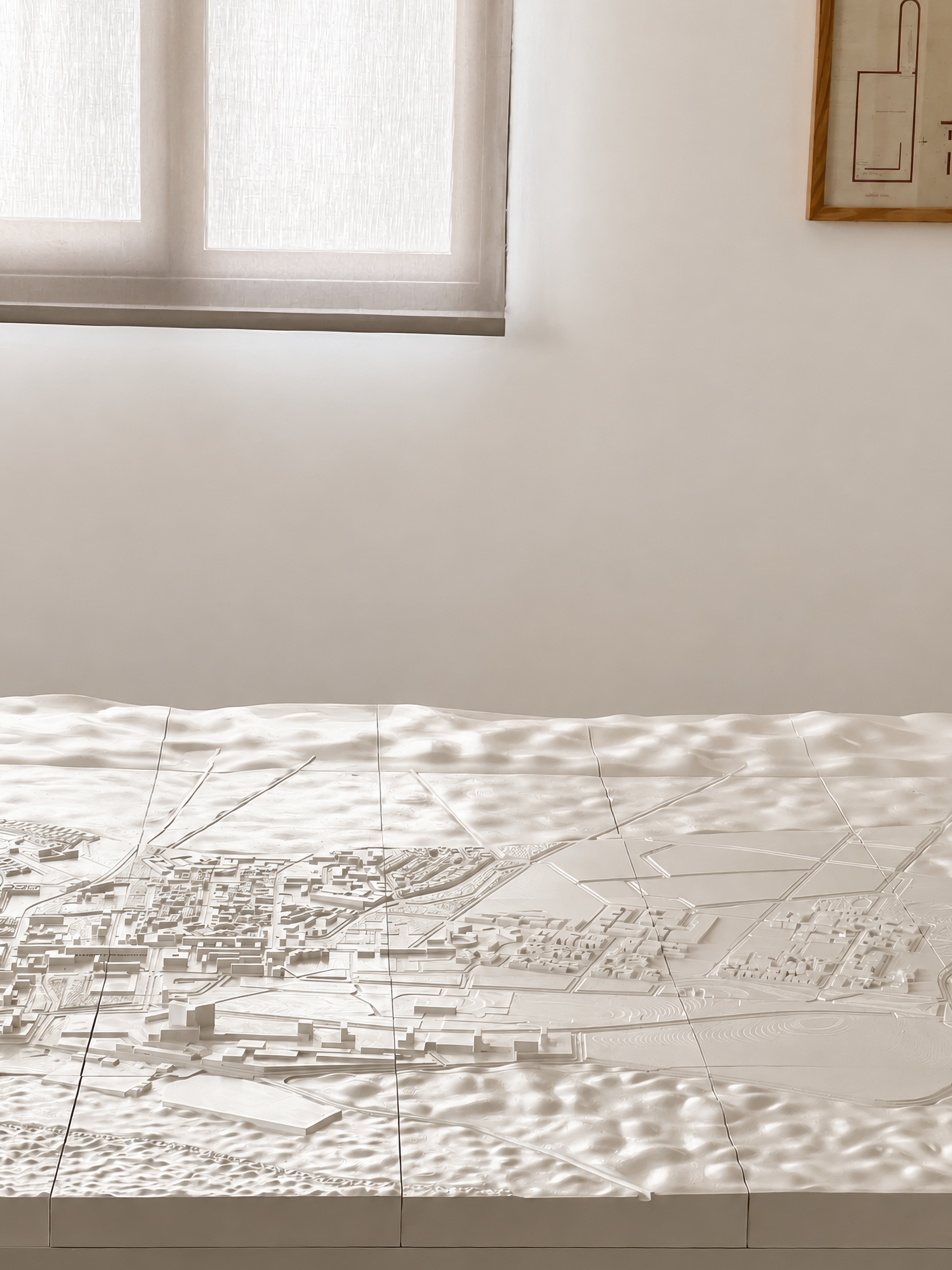 Close-up of the 3D-printed terrain model surface in raking light